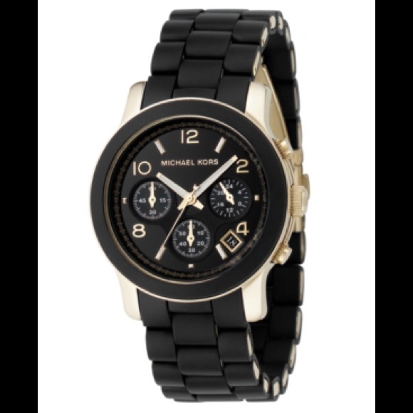 Michael kors black and gold chronograph watch.